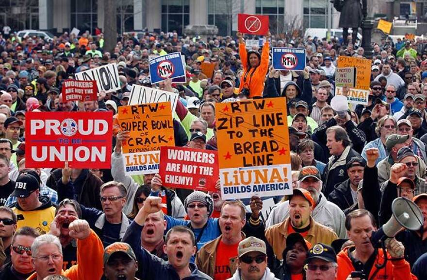 Union protestors gathered outside the Statehouse after the Senate voted to pass the right-to-work bill on Feb. 1, 2012.