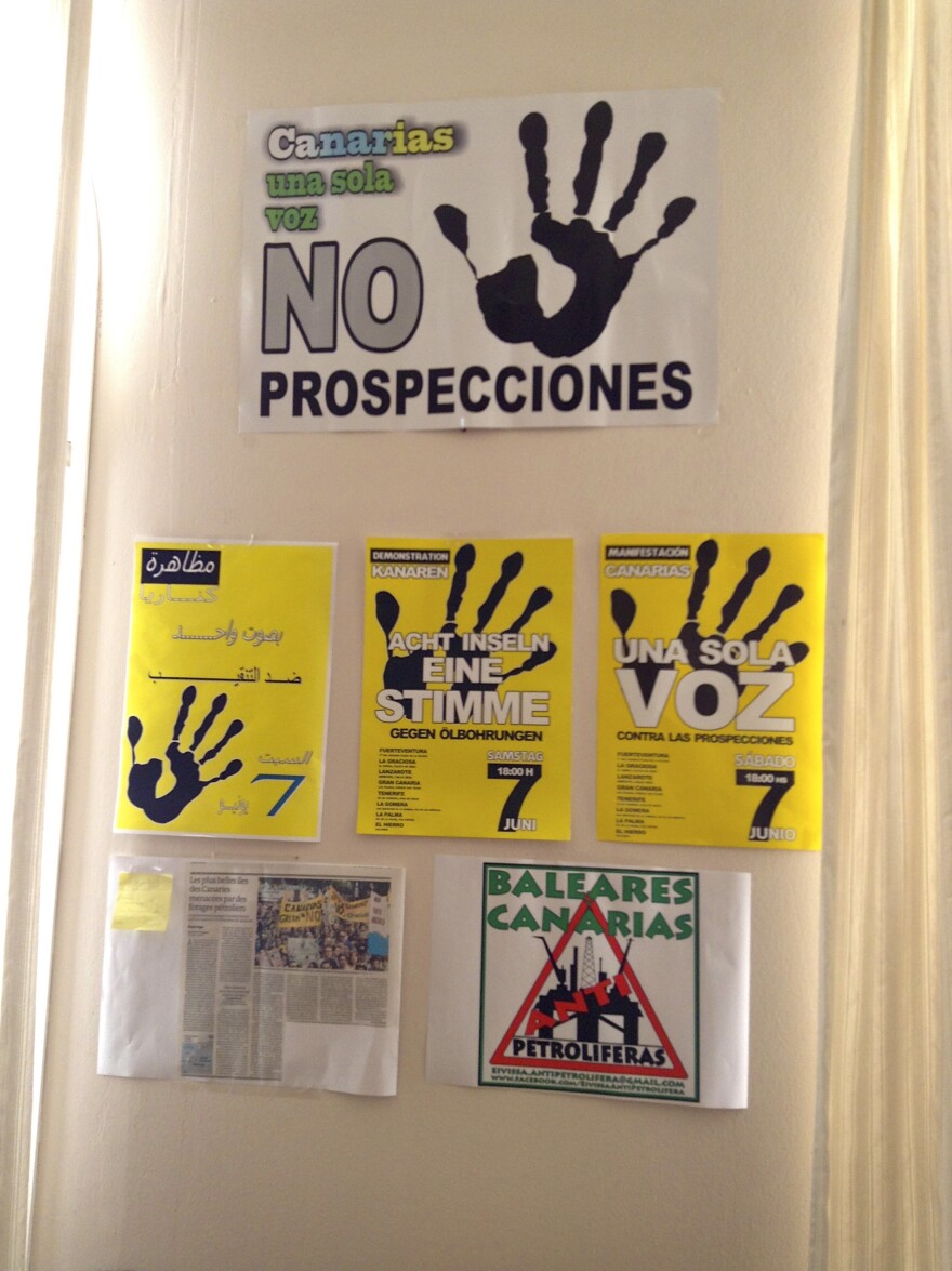 Local activists have printed posters in several languages (here shown in Spanish, Arabic and German) to try to convince tourists and locals to oppose oil drilling in the Canary Islands.