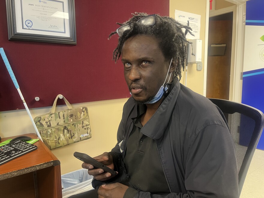 Robert Callender Junior has learnt how to use a phone through the program.