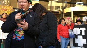 Josefina Mora, left, speaks about her mother's deportation case at news conference in January, 2018 outside the Seattle Immigration Court. Her mother, Maru Mora-Villalpando, buries her head on her shoulder as both women fight back tears.