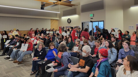 The Springfield School District's board meeting was standing room only Monday night ahead of a budget vote to reduce staffing and cut back dual immersion for older students.