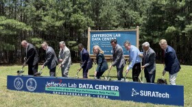Jens Dilling with the Jefferson Lab (L), Sean Hearne with SURA, Virginia Tech PresidentTim Sands, Newport News Mayor Philip Jones, Gov. Abigail Spanberger, DOE Under Secretary for Science Darío Gil, Sen. Mark Warner, Rep. Bobby Scott and Rep. Rob Wittman break ground of the future Jefferson Lab Data Center and High Performance Data Facility, Friday, June 12.
