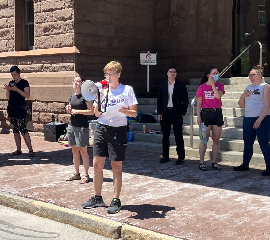 Michelle Casey, President & CEO of Planned Parenthood of Central and Western New York speaks at a rally for abortion rights, in front of Rochester City Hall.