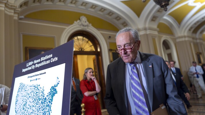 Senate Minority Leader Chuck Schumer, D-N.Y., arrives to speak with reporters about Senate Republicans' efforts to claw back $1.1 billion of funding authority from the Corporation for Public Broadcasting and about $8.3 billion from foreign aid programs targeted by DOGE, at the Capitol in Washington, Tuesday, July 15, 2025. (AP Photo/J. Scott Applewhite)