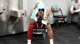 North Carolina State guard Breon Pass sits on the locker room after the NCAA college basketball game against Purdue at the Final Four, Saturday, April 6, 2024, in Glendale, Ariz.