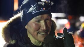 Gregory Larson talks with reporters following his 2020 Akiak Dash victory in Bethel, Alaska.