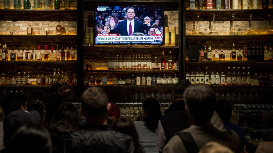 A crowd gathered for a watch party at The Partisan bar in Washington, D.C., on Thursday, as former FBI Director James Comey testified before the Senate Select Intelligence Committee.