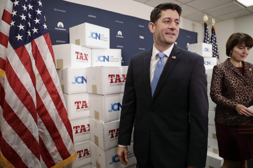 Speaker of the House Paul Ryan, R-Wis., followed at right by Rep. Cathy McMorris Rodgers, R-Wash., walks past boxes of petitions supporting the Republican tax reform bill that is set for a vote later this week as he arrives for a news conference on Capitol Hill in Washington, Tuesday, Nov. 14, 2017. (J. Scott Applewhite/AP)