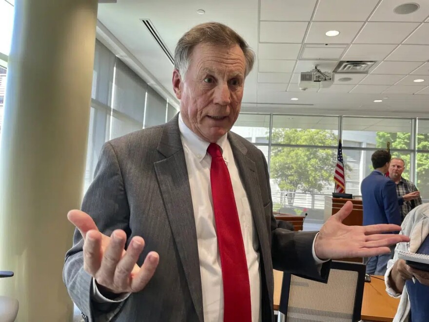 North Carolina Insurance Commissioner Mike Causey talks to reporters about a bill that would let Blue Cross Blue Shield of North Carolina reorganize, Monday, April 24, 2023, at the Albemarle Building in Raleigh, N.C.