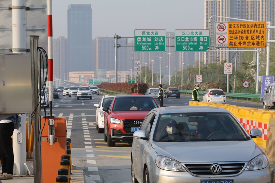 At midnight on April 8, all highway checkpoints installed on Jan. 23 were removed. Cars lined up on the road, waiting to leave after the intracity traffic ban was lifted.