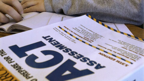 FILE - This April 1, 2014 file photo shows an ACT Assessment test in Springfield, Ill. The popular ACT college admissions exam is broadening how it reports student's scores. The exam's traditional 36-point scale remains unchanged, but starting next year students will receive an ACT score on two new "readiness indicators" reflecting how they did in terms of career readiness and understanding a complex text.