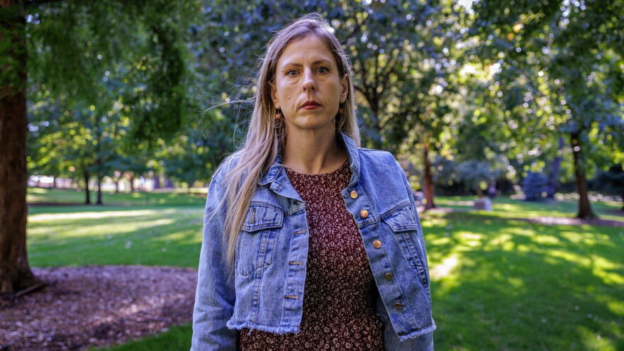 Megan McCarty poses at Riverside Park in Grants Pass, Oregon. McCarty, who came to 5Rock Ranch after being held captive on a cannabis grow, said she was denied permission to leave the ranch to seek professional counseling.