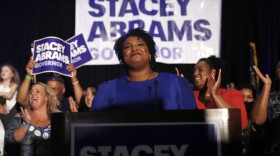 Georgia Democratic gubernatorial candidate Stacey Abrams smiles before speaking to supporters during an election-night watch party, Tuesday, May 22, 2018, in Atlanta. (John Bazemore/AP)