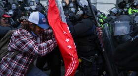 Security forces clash with President Trump's extremist supporters after they breached the U.S. Capitol security in Washington, D.C. on Jan. 6. (Tayfun Coskun/Anadolu Agency via Getty Images)