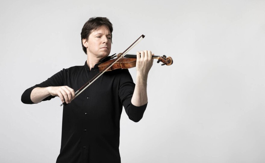 Violinist Joshua Bell plays a violin.
