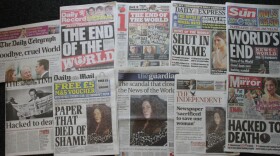 Various front pages of London newspapers report on the closing of the national tabloid newspaper <em>News of The World</em> in London, England.