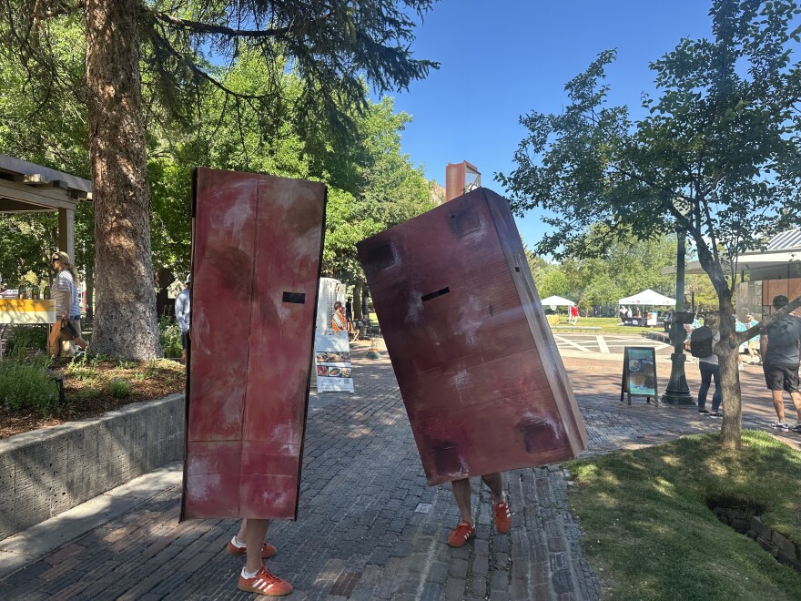 Artists dress up as the bricks paving Aspen’s pedestrian mall on Cooper Avenue on June 27, 2026.