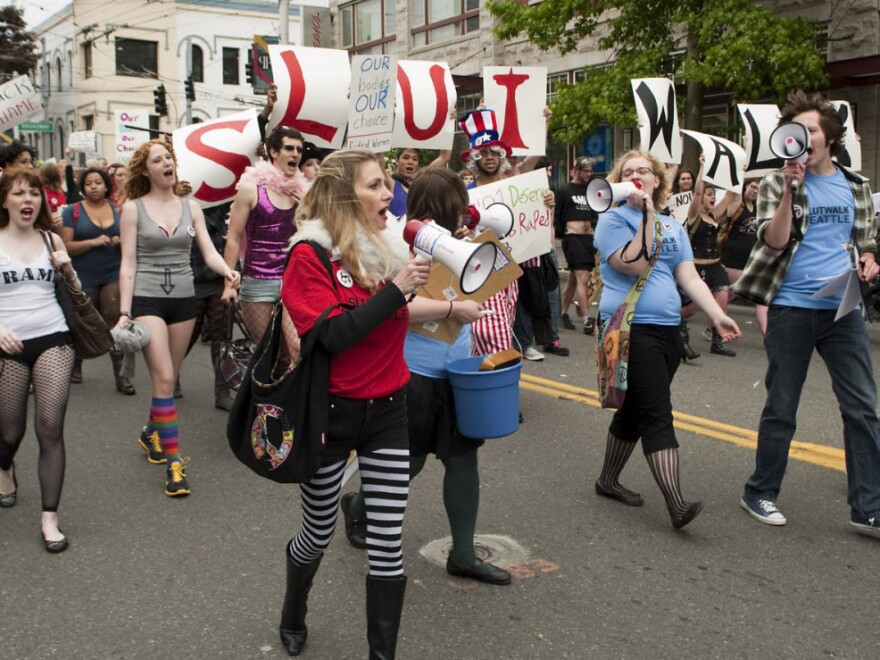 Protesters march at the SlutWalk in Seattle on June 19. SlutWalks began in April when a Toronto police officer suggested women "avoid dressing like sluts" to not be victimized.