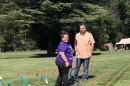 Volunteers create a grid on the lawn at Montpelier to prepare for the creation of a living flag.