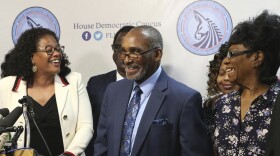 Clifford Williams, center, and his wife Leatrice Williams along with Rep. Kimberly Daniels, D-Jacksonville, left, celebrate at a news conference after his claims bill for wrongful imprisonment passed during session Tuesday March 10, 2020, in Tallahassee, Fla.