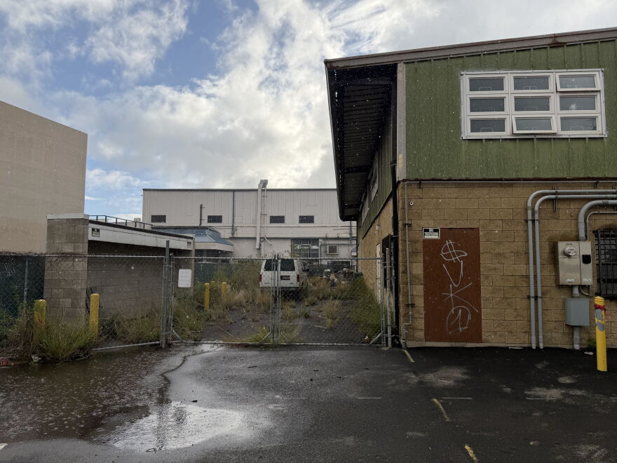 Rain falls on warehouses in the Iwilei neighborhood of Honolulu on Thursday, Oct. 8, 2026.