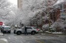 A police car blocks a street near the Brown University campus on Sunday, Dec. 15, 2025.