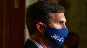 Kentucky Governor Andy Beshear speaks to reporters following the signing of bills related to the American Rescue Plan Act at the Kentucky State Capitol in Frankfort, Ky., Wednesday, April 7, 2021. 