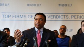 Fox News anchor Kelly Wright speaks to the media as he joins other current and former Fox employees at a press conference organized by his attorney Doug Wigdor on April 26, 2017 in New York. (Spencer Platt/Getty Images)