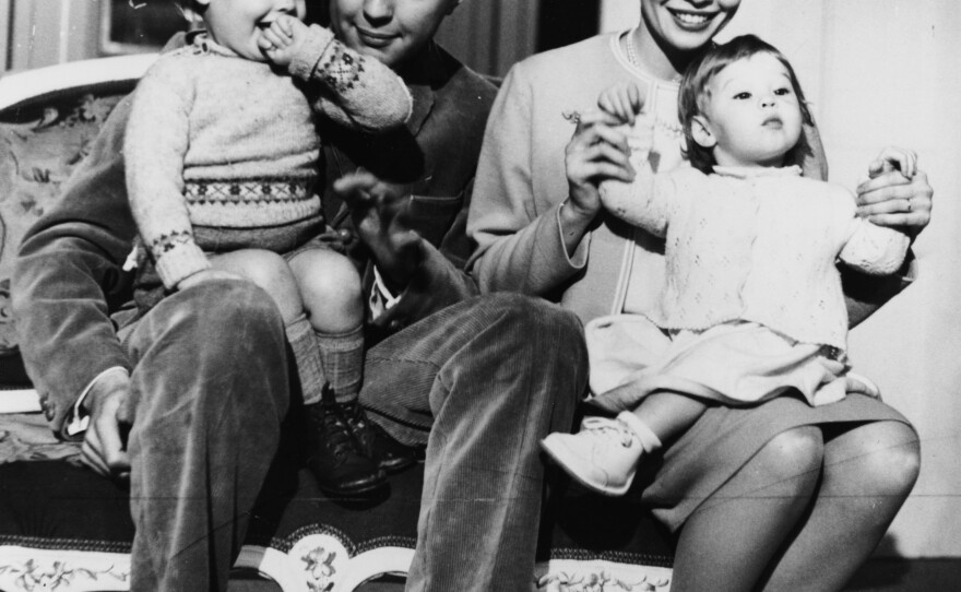 Hall had six children by four wives. He's pictured above with actress and dancer Leslie Caron and their children Christopher and Jennifer at their Montpelier Square home, around 1960.