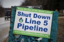One of the many signs opposing Line 5 seen along roads in Leelanau County, Michigan.