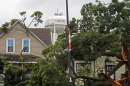 Storm damage can be seen throughout Lansing, Illinois, on Aug. 14, 2026.