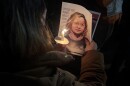 Hundreds of people gathered in a city park in Detroit Friday night to protest the fatal shooting of a woman in Minneapolis by a federal immigration officer