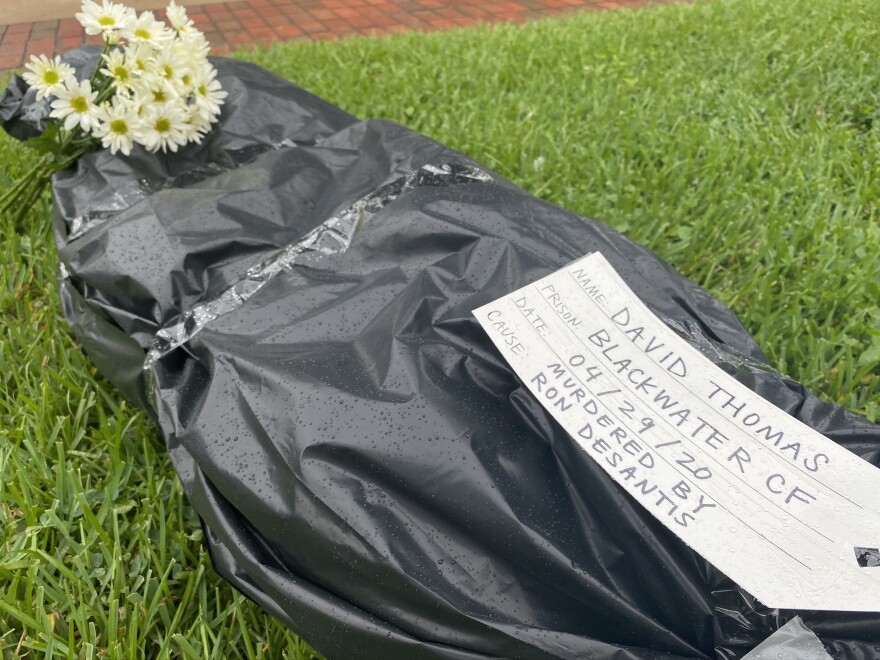 A mock-graveyard on the Historic Capitol grounds created by the Florida Prisoner Solidarity.