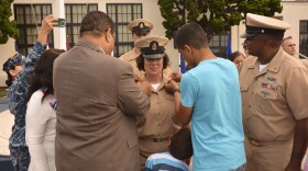 Angelina Gabriel's family surrounds her as she's promoted to the rank of Navy Chief Petty Officer in a September ceremony. Gabriel's husband also is a Chief Petty Officer in the Navy.