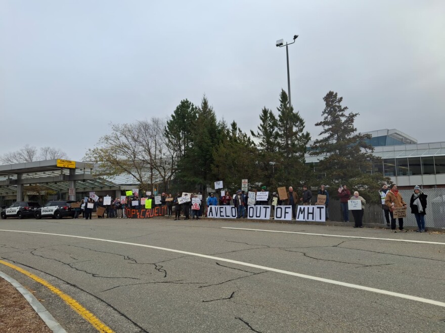 About 70 protesters urged travellers to boycott Avelo at Manchester-Boston Regional Airport on Sunday, Nov. 23, 2025.