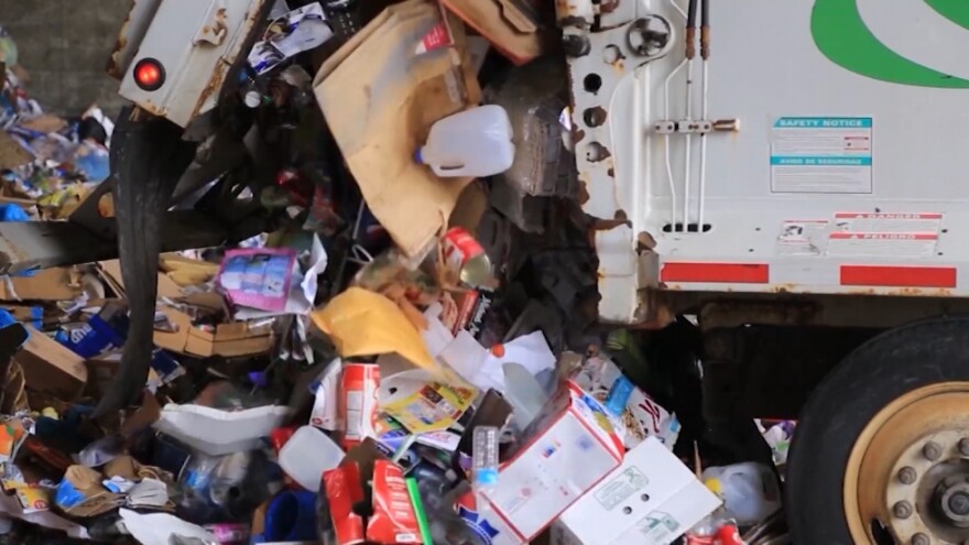 A truck unloads recycling at Kimble Companies in Twinsburg. [Mary Fecteau and Margaret Cavalier / ideastream]