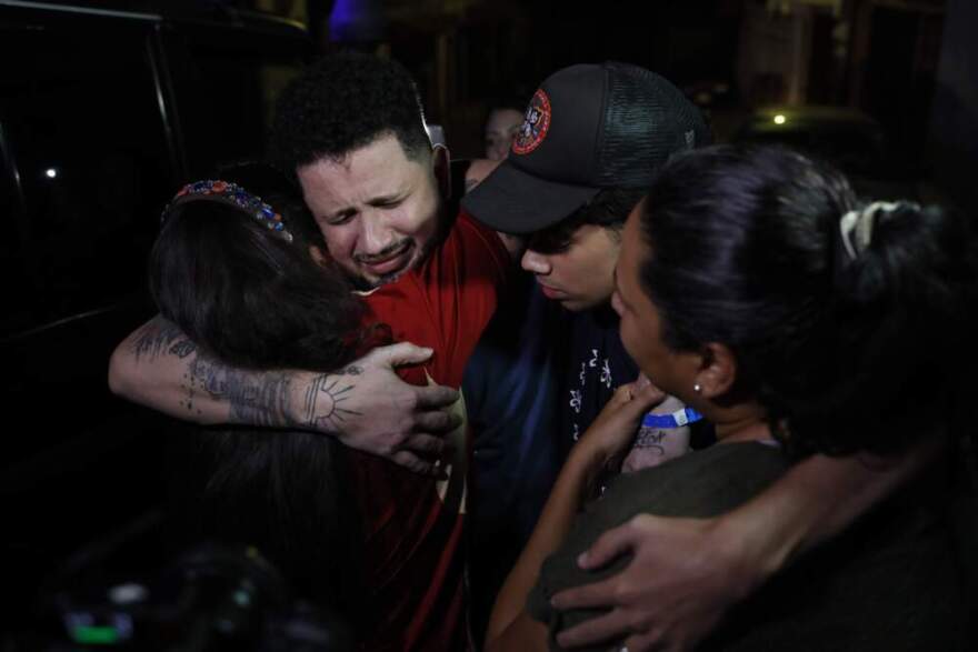 Arturo Suárez, one of the Venezuelan migrants deported months ago to El Salvador by the United States under the Trump administration's immigration crackdown, is welcomed home by his relatives in Caracas, Venezuela, Tuesday, July 22, 2025. (Cristian Hernandez/AP)