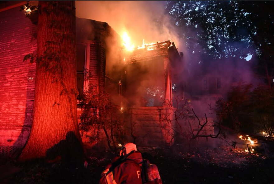 Evansville firefighters battle a house fire in the 1400 block of SE 2nd St., Sun., Sept. 27, 2026