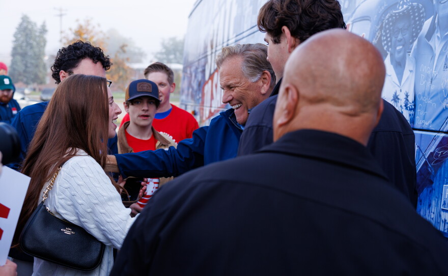 Republican U.S. Senate nominee Mike Rogers greets supporters in Lansing Township, Mich., on Oct. 24, 2026, during a stop on his "We Have a State to Save" bus tour.