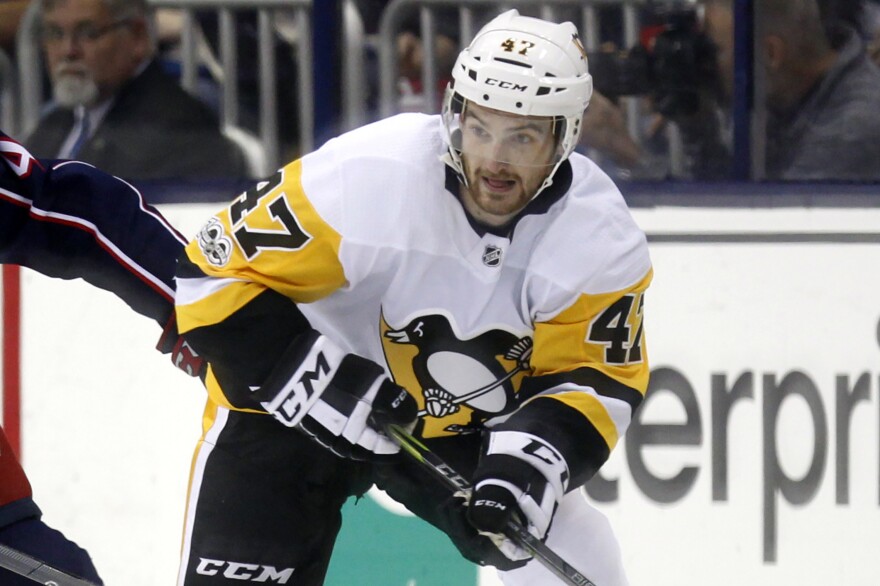 Former Pittsburgh Penguins forward Adam Johnson, 29, in action during an NHL hockey game in Columbus, Ohio, in 2017. Johnson died after a "freak accident" during a game in England on Saturday, Oct. 28, his club, the Nottingham Panthers said.