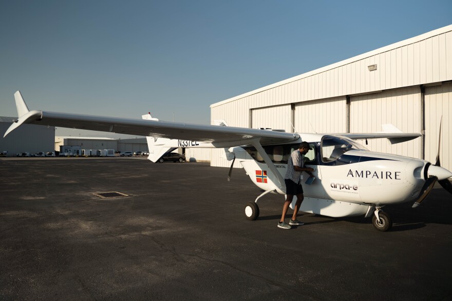 Ampaire's hybrid plane, EEL, sits outside a hangar.
