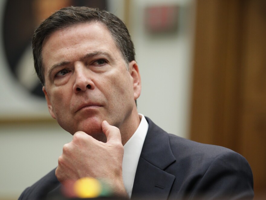 FBI Director James Comey says new encryption features allow people "to place themselves beyond the law."
