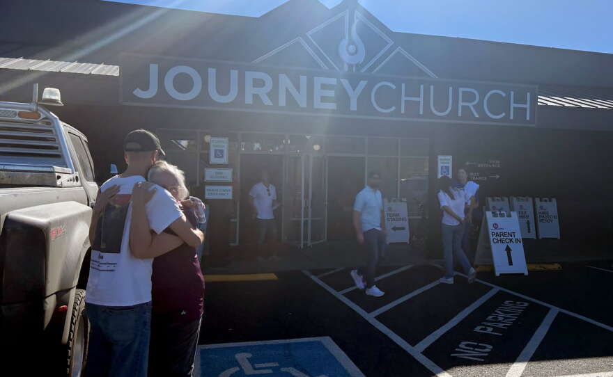 People meet at Journey Church in Bend, Ore., to be unified with students from Silver Rail Elementary School, Oct. 15, 2026, following reports of an active shooter.