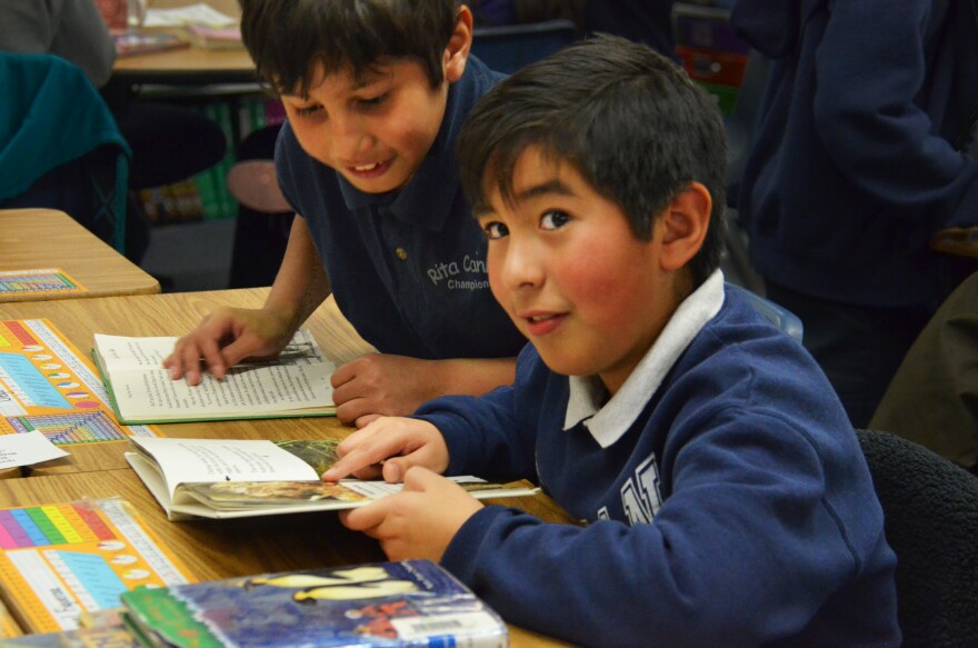 Diego Salazar and Miguel Figueroa read in Cheri Kuykendall's fourth-grade class. Students had just done a close reading of a text; now they are able to choose the books they want to read.