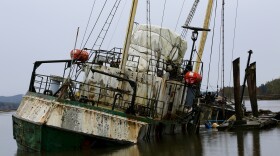 In its prime, the Hero sailed through frigid temperatures and ice-strewn waters in the South Pole. But now it's sinking, leaking oil and threatening Washington's oysters.