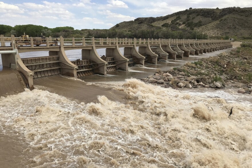 FILE - A dam along the Rio Grande is seen near San Acacia, N.M., May 9, 2021. On Tuesday, June 27, 2023, some New Mexico lawmakers warned that the state’s fight with neighboring Texas over management of one of North America’s longest rivers has yet to be settled and that leaving farmland unplanted won’t be the long-term answer to ensuring Texas gets its share. (AP Photo/Susan Montoya Bryan, File)