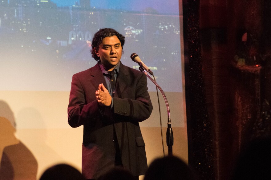 Michael Perera speaking at a "Why We Stayed Here" event at Theatre Off Jackson on January 17, 2018.