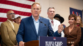 Michigan U.S. Senate candidate Mike Rogers speaks to reporters at a campaign office in Taylor, Michigan on Saturday, September 19.