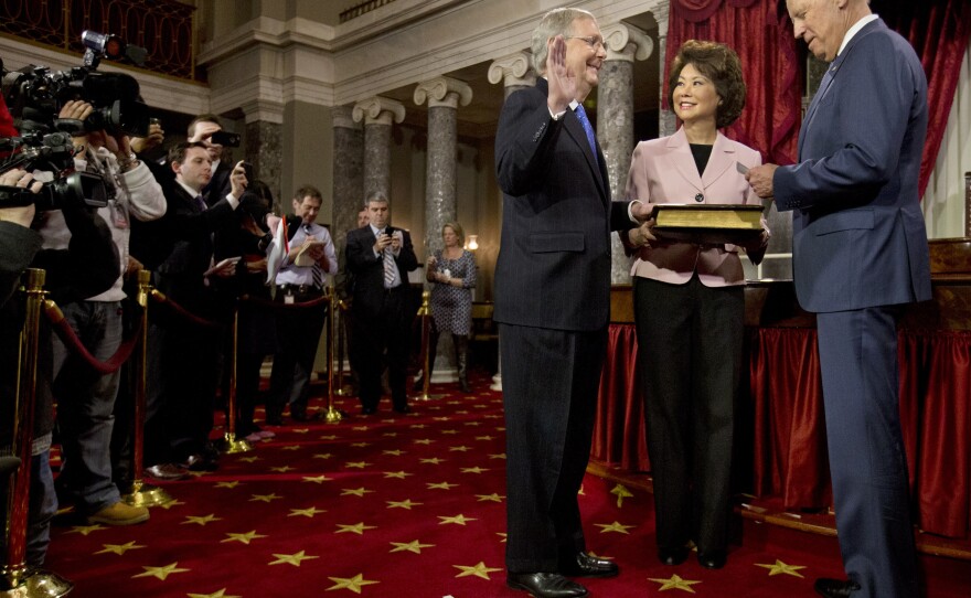 Biden administers the Senate oath to incoming Senate Majority Leader Mitch McConnell.