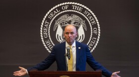 A photo of Gov. Spencer Cox at a press conference. 
